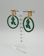 Load image into Gallery viewer, golden metal clip-on with green dyed jade beads and painted tin frogs
