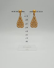 Load image into Gallery viewer, golden metal clip-on earrings with decorative elements
