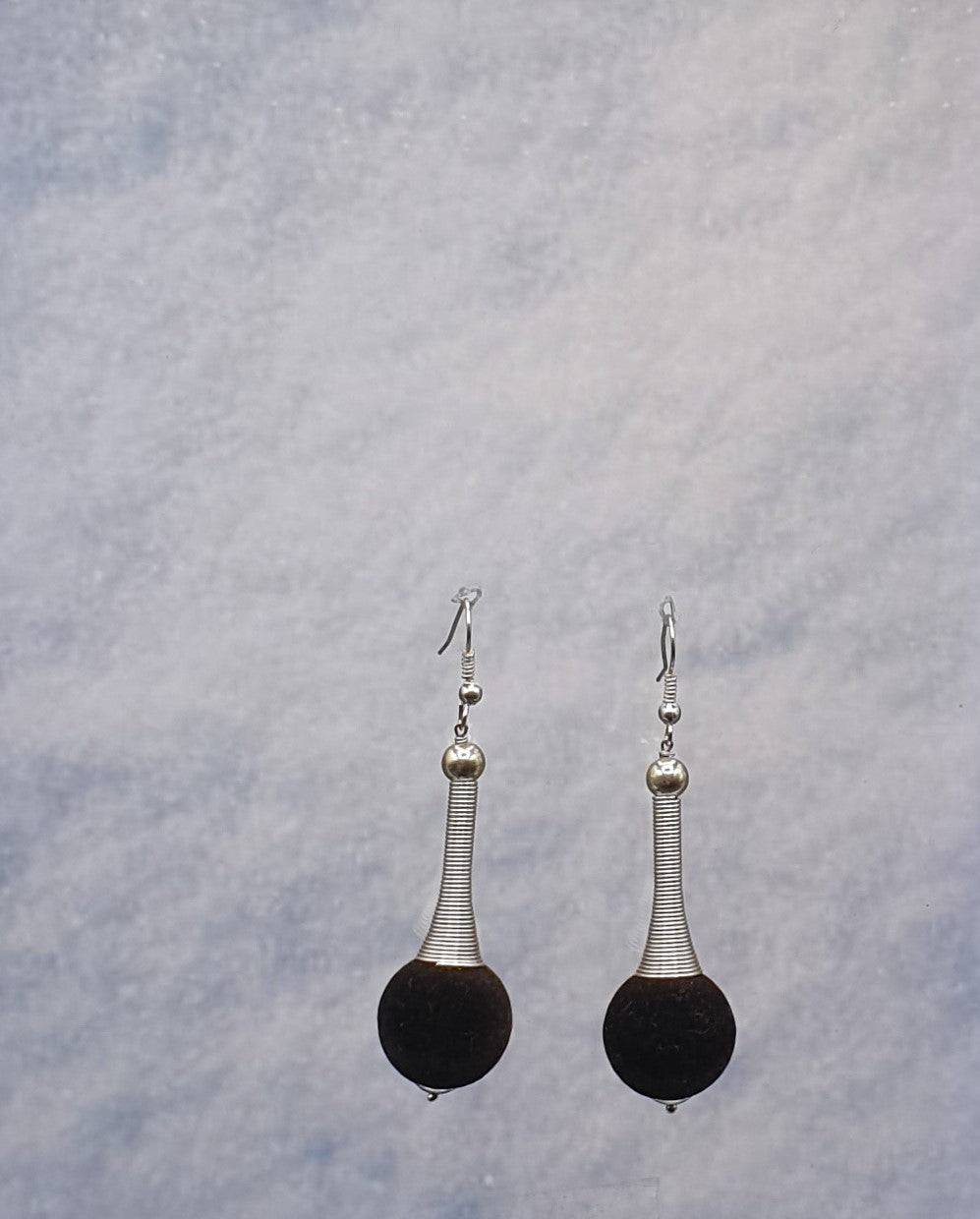 silver metal dangle earrings with black velvet beads
