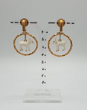 Load image into Gallery viewer, golden metal clip-on earrings with gold plated beads and enamel goats
