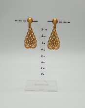 Load image into Gallery viewer, golden metal clip-on earrings with decorative elements
