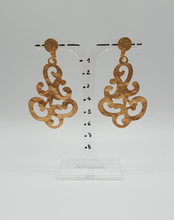 Load image into Gallery viewer, golden metal clip-on earrings with decorative elements
