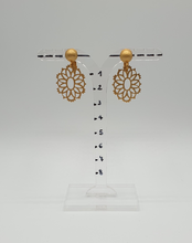 Load image into Gallery viewer, golden metal clip-on earrings with decorative element
