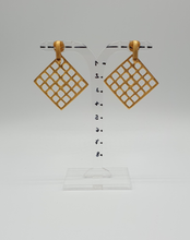 Load image into Gallery viewer, golden metal clip-on earrings with decorative square elements
