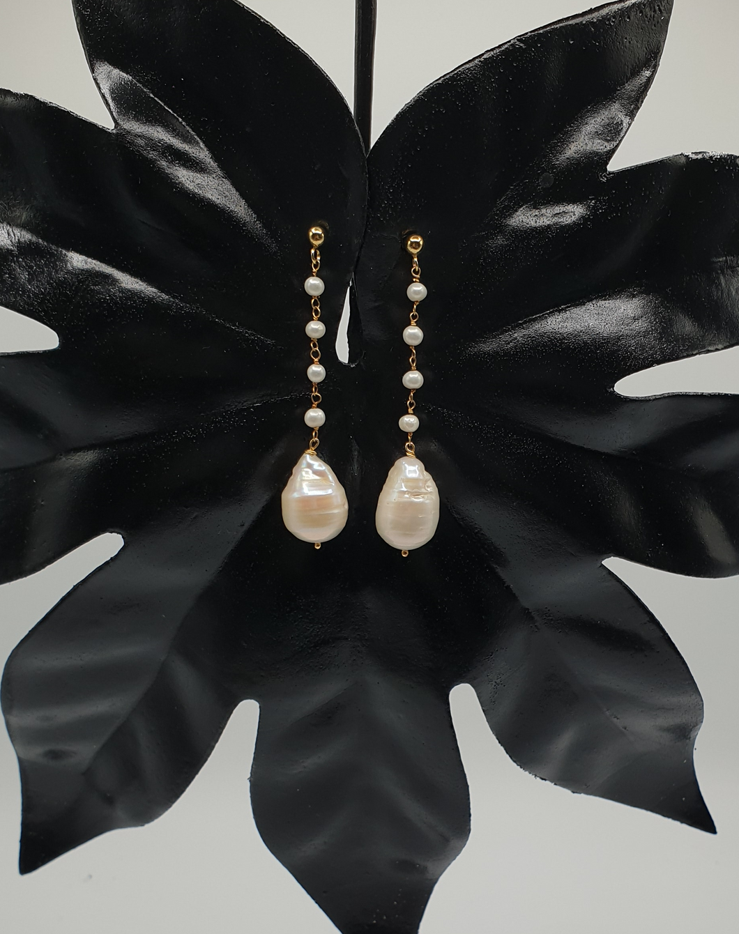 gold plated silver stud earrings with pearls on a mini pearl chain