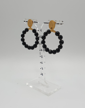 Load image into Gallery viewer, golden metal stud earrings with facetted black agate beads
