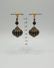 Load image into Gallery viewer, golden metal clip-on earrings with black chinese lantern element
